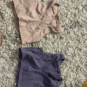 Two garage tank tops